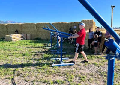 A man firing a corn cannon